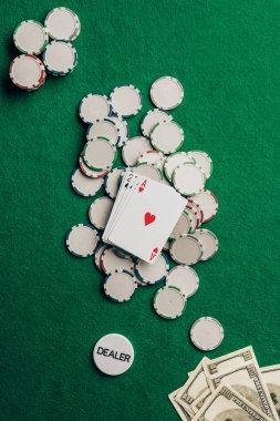 Live casino table with dealer and multiple card decks